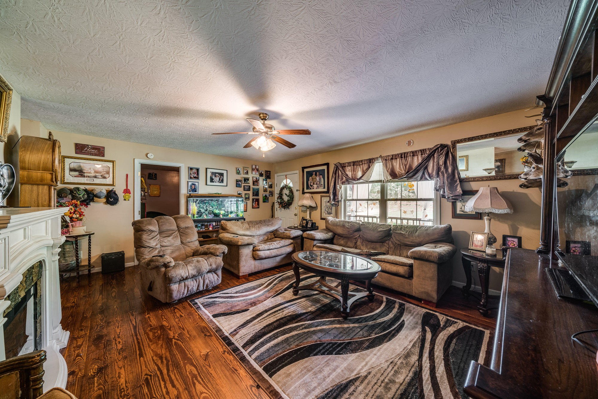 1556 Bicknell Road Clarkrange, TN 38553 - Photo 38 of 40 a view of a livingroom with furniture window and wooden floor