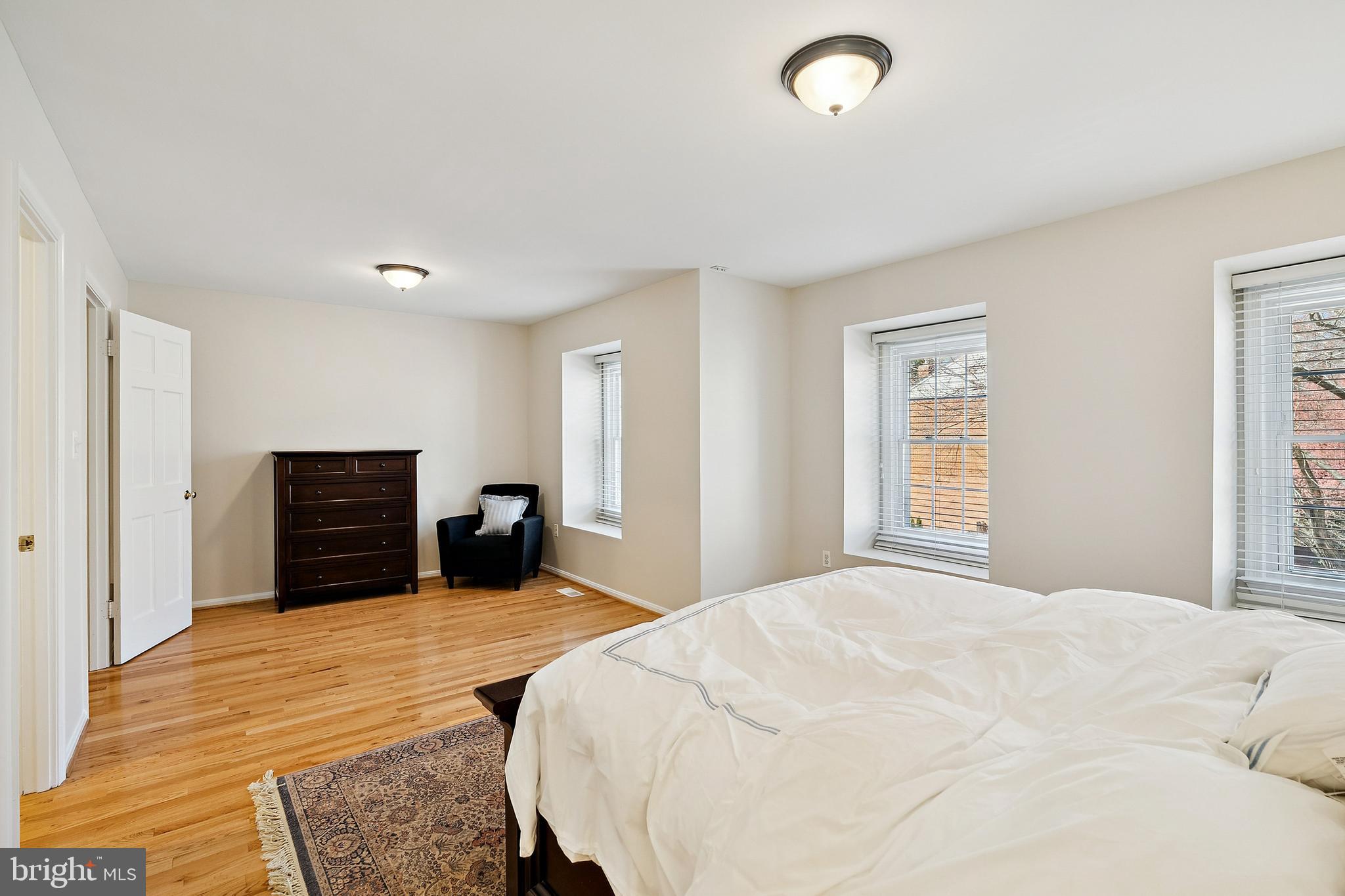 7810 Ashley Glen Road Annandale, VA 22003 - Photo 14 of 33 a bedroom with a bed and a television