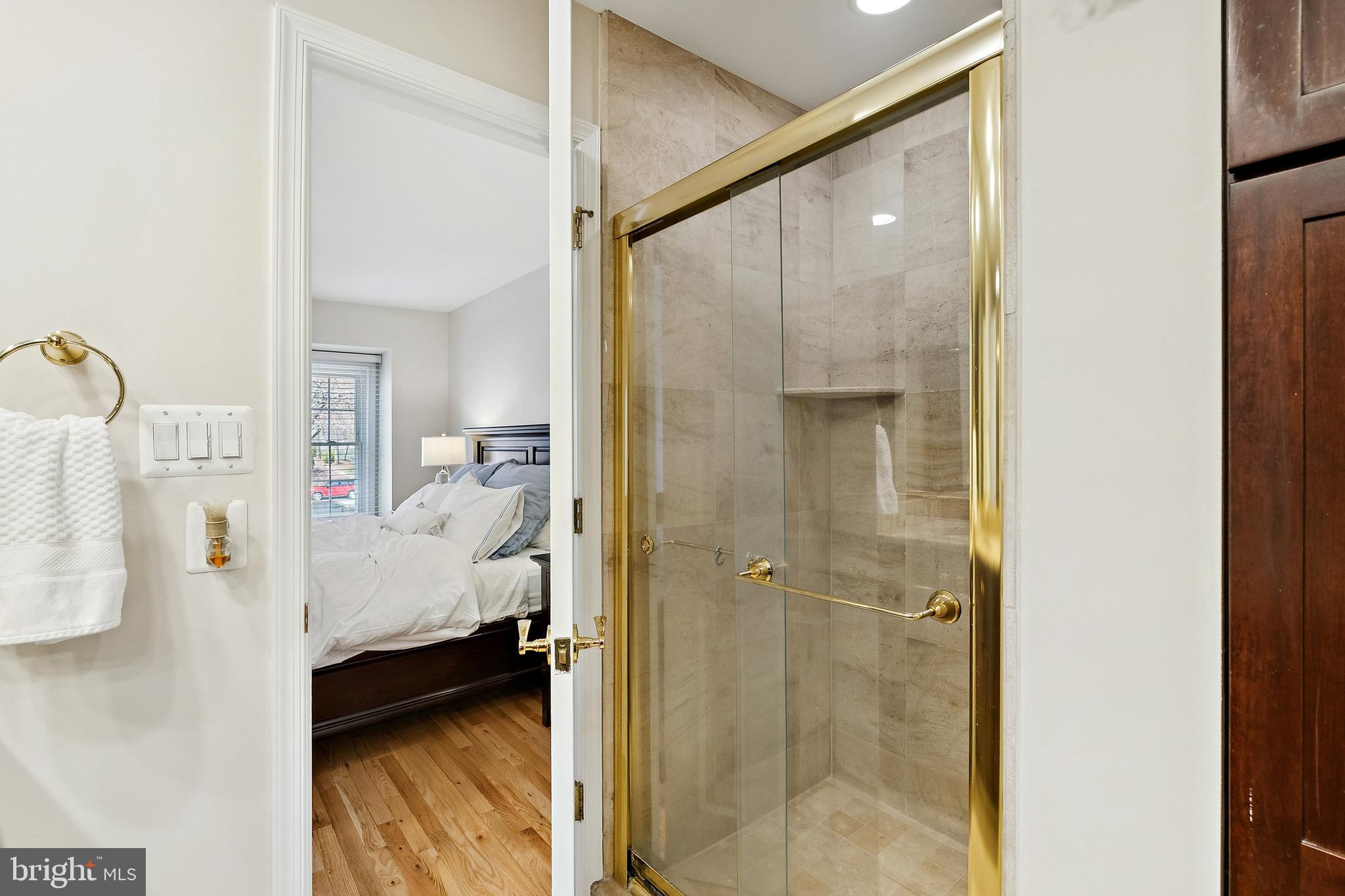 7810 Ashley Glen Road Annandale, VA 22003 - Photo 16 of 33 a bathroom with a tub and shower
