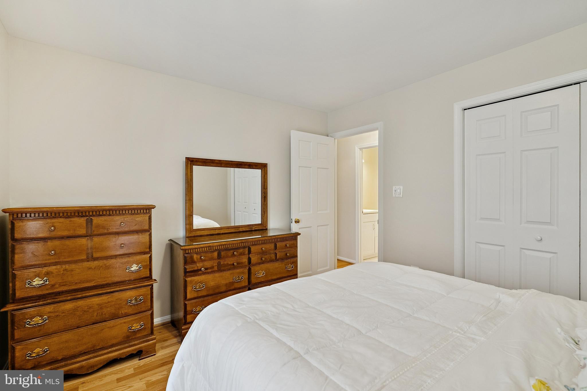 7810 Ashley Glen Road Annandale, VA 22003 - Photo 19 of 33 a bedroom with a bed and a dresser