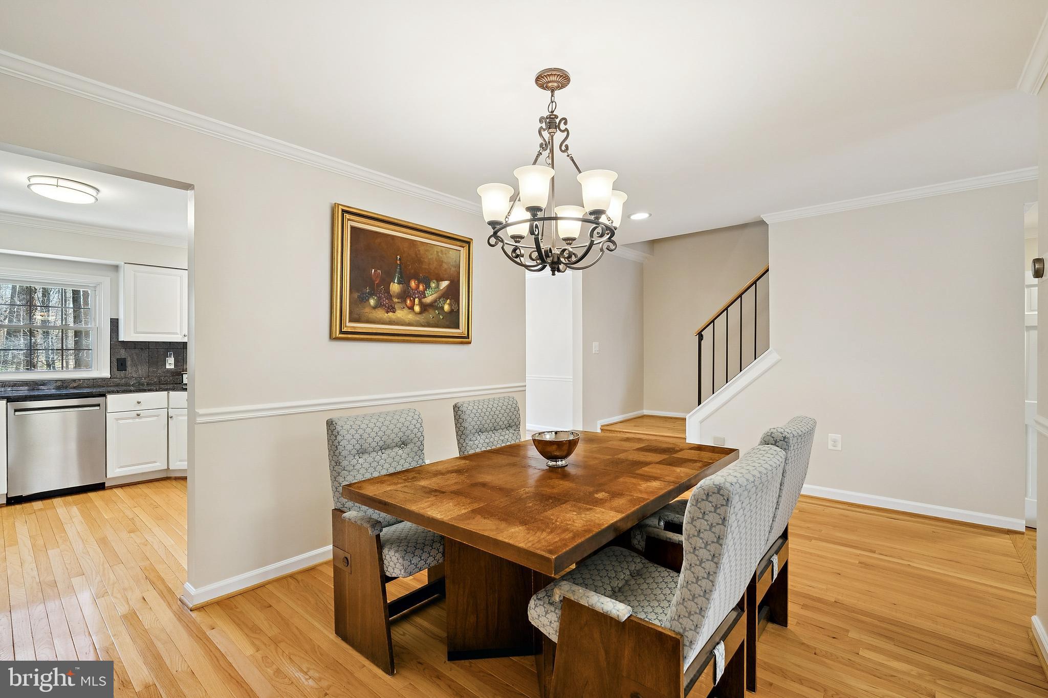 7810 Ashley Glen Road Annandale, VA 22003 - Photo 6 of 33 a view of a dining room with furniture and wooden floor