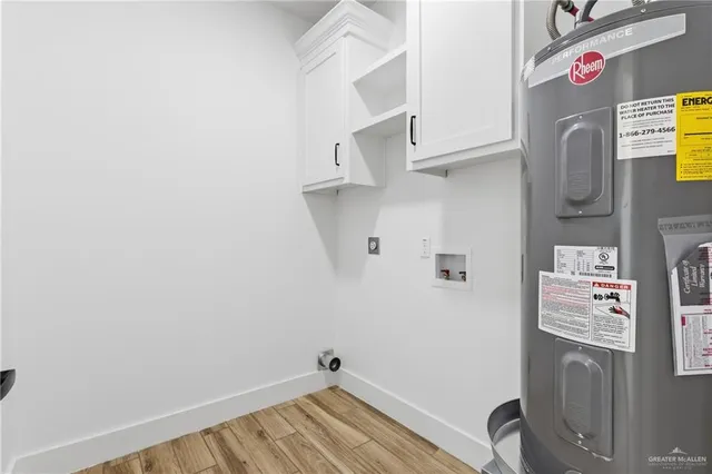 a view of storage and utility room with racks on the wall