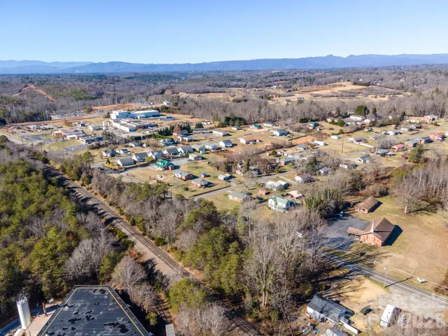 an aerial view of residential house with outdoor space