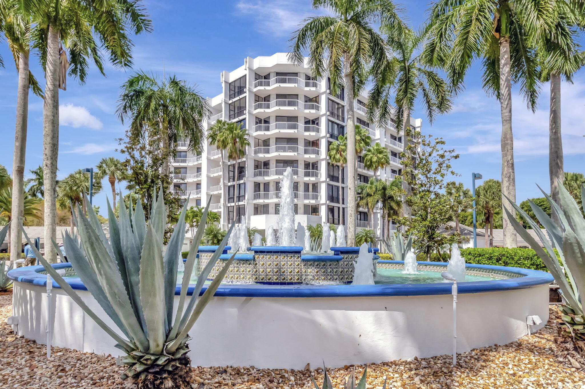 20290 Fairway Oaks Drive, Unit 254 Boca Raton, FL 33434 - Photo 1 of 104 a view of a backyard with plants and palm trees