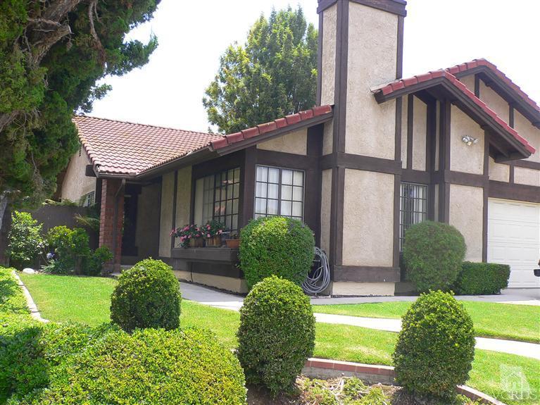 4340 Mill Valley Road Moorpark, CA 93021 - Photo 1 of 11 a front view of a house with garden
