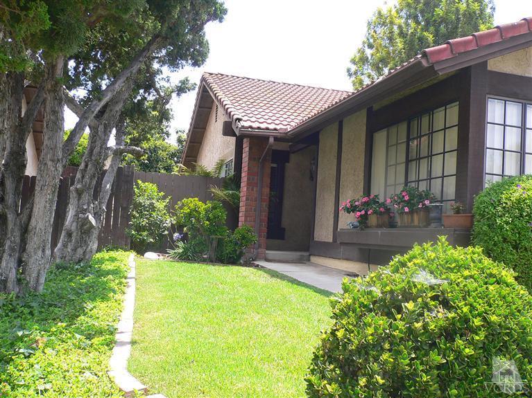 4340 Mill Valley Road Moorpark, CA 93021 - Photo 2 of 11 a front view of a house with garden