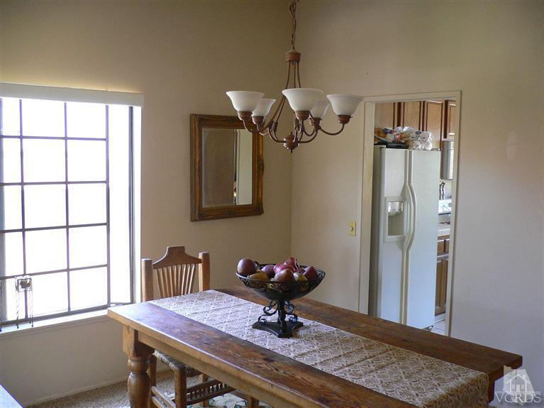 4340 Mill Valley Road Moorpark, CA 93021 - Photo 4 of 11 a view of a workspace with furniture and a window