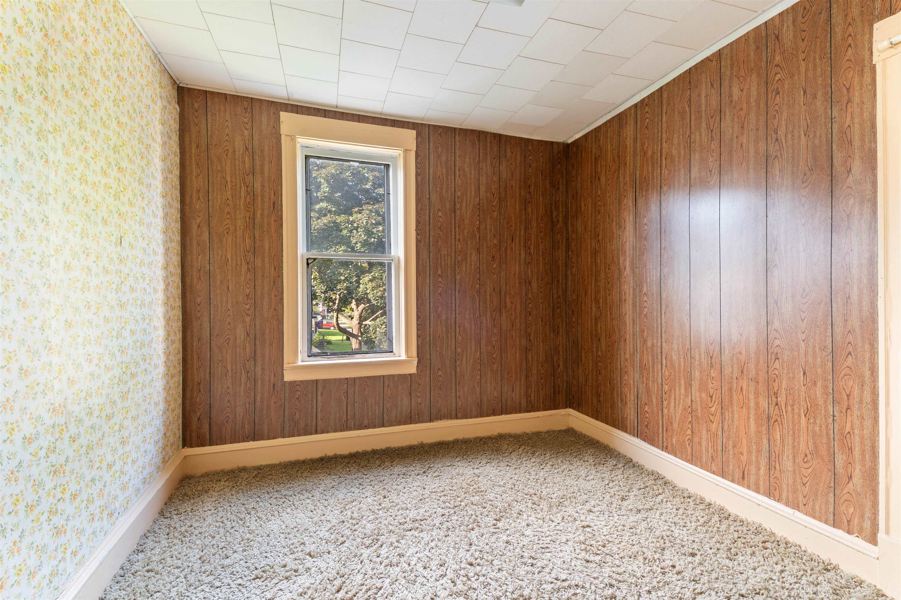1301 North 11th Street Superior, WI 54880 - Photo 12 of 21 Unfurnished room with light carpet and baseboards
