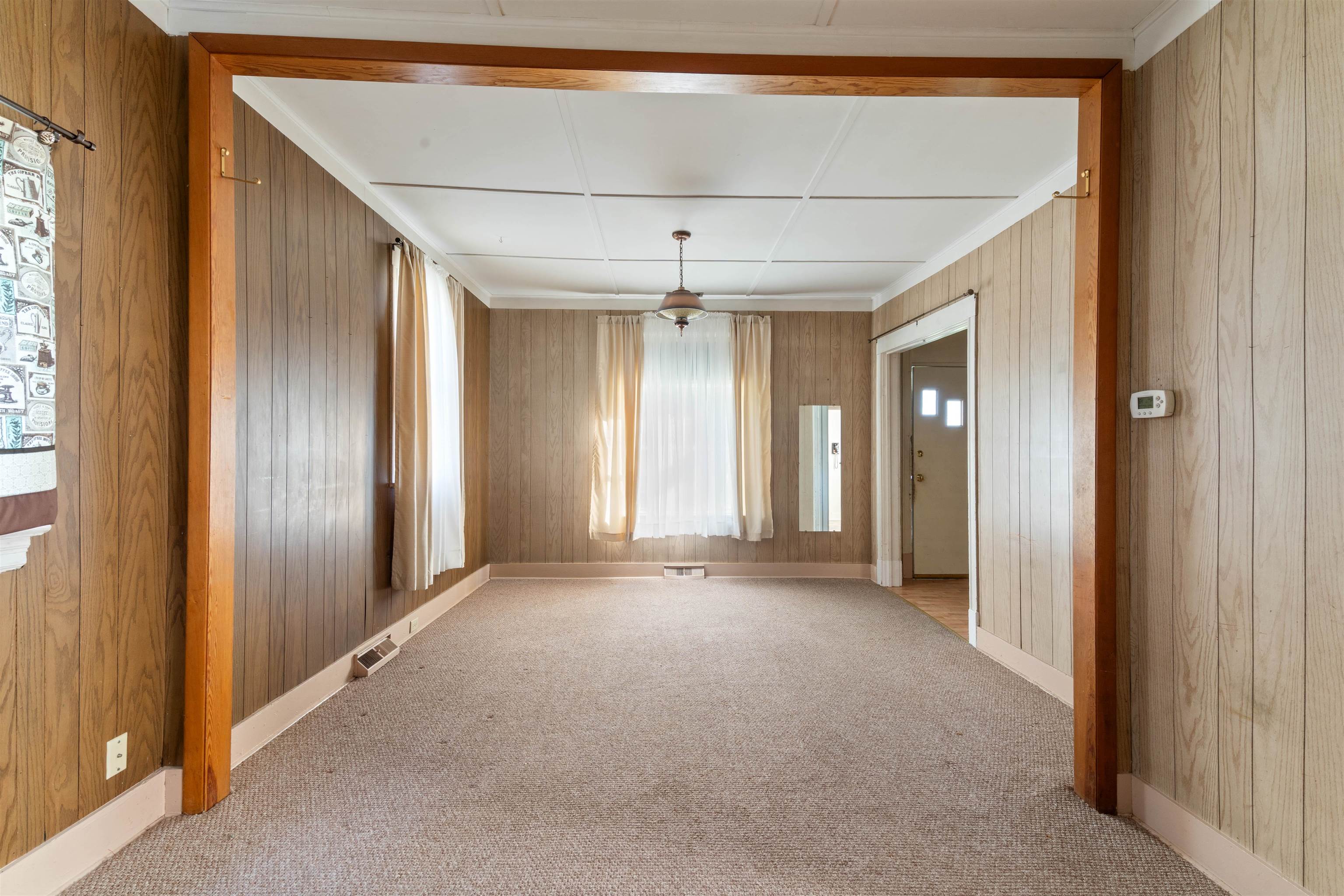 1301 North 11th Street Superior, WI 54880 - Photo 3 of 21 Unfurnished room with carpet and wood walls