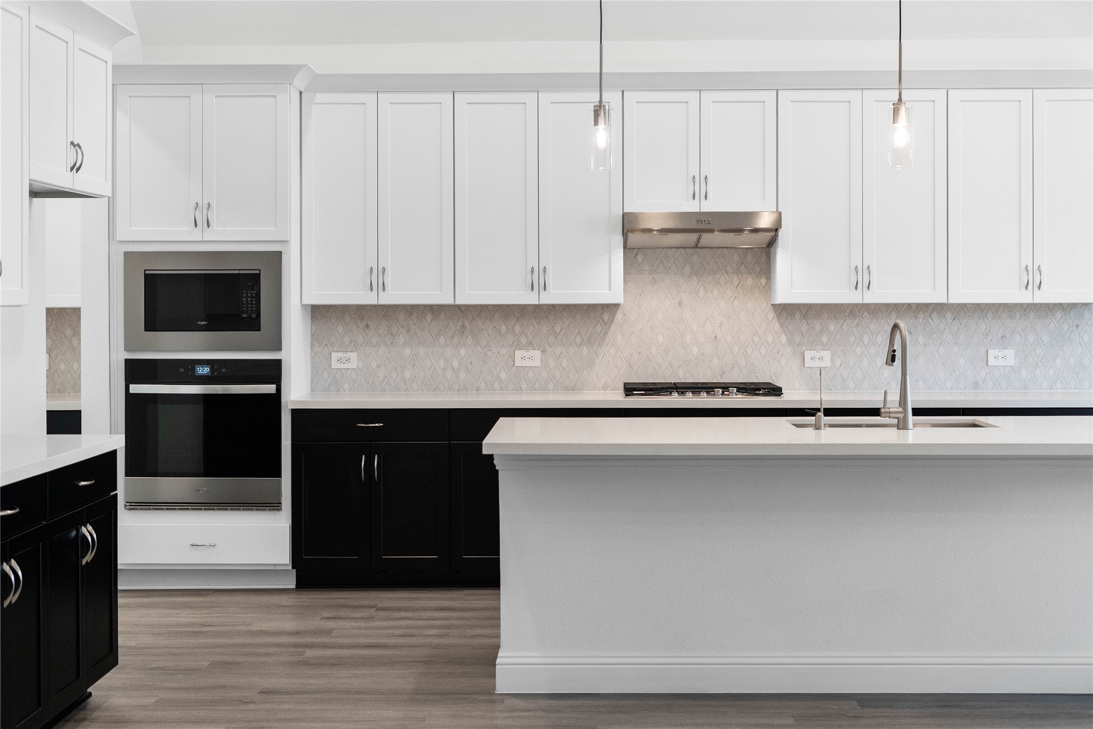 17315 July Moon Lane Conroe, TX 77302 - Photo 13 of 46 The appliances in this kitchen feature a sleek, modern stainless steel finish, perfect for its durability and timeless appeal.