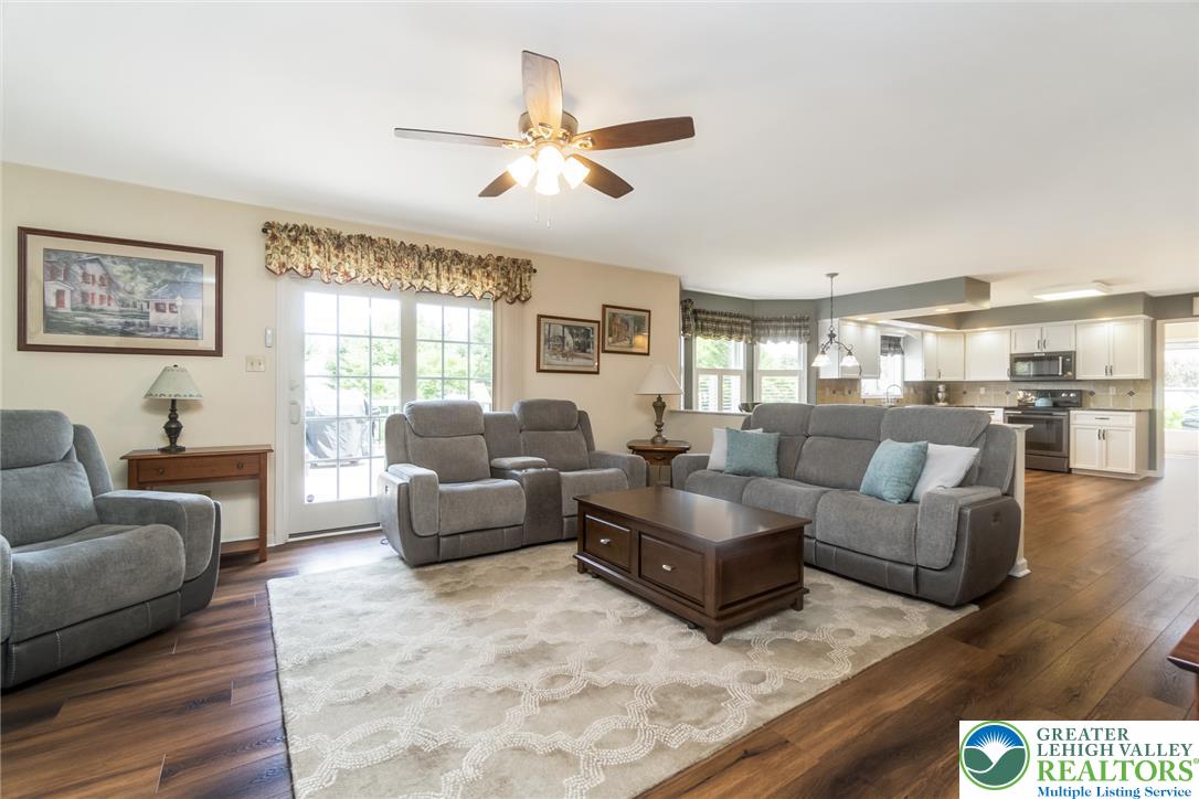 1795 Freier Road Quakertown, PA 18951 - Photo 15 of 69 An inviting gathering space combines relaxation with culinary convenience, offering seamless flow to outdoor living.