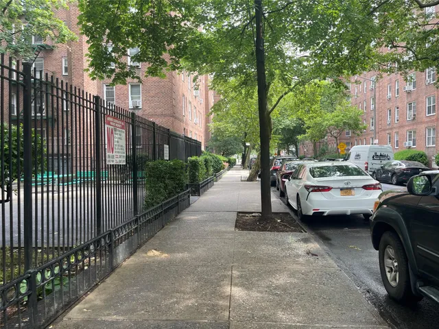a view of a car park in front of a building