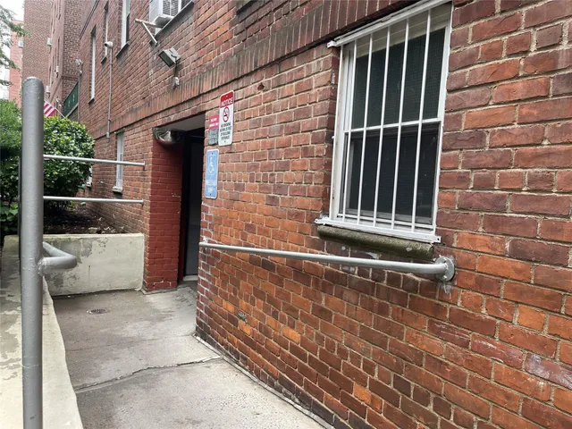 a utility room with multiple dryer and washer