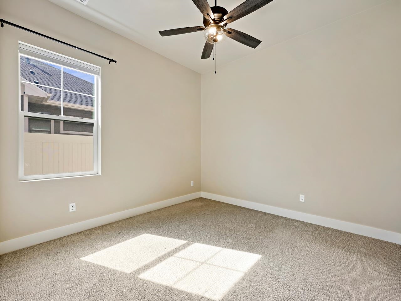 823 Red Apple Road Grand Junction, CO 81505 - Photo 23 of 38 an empty room with a window