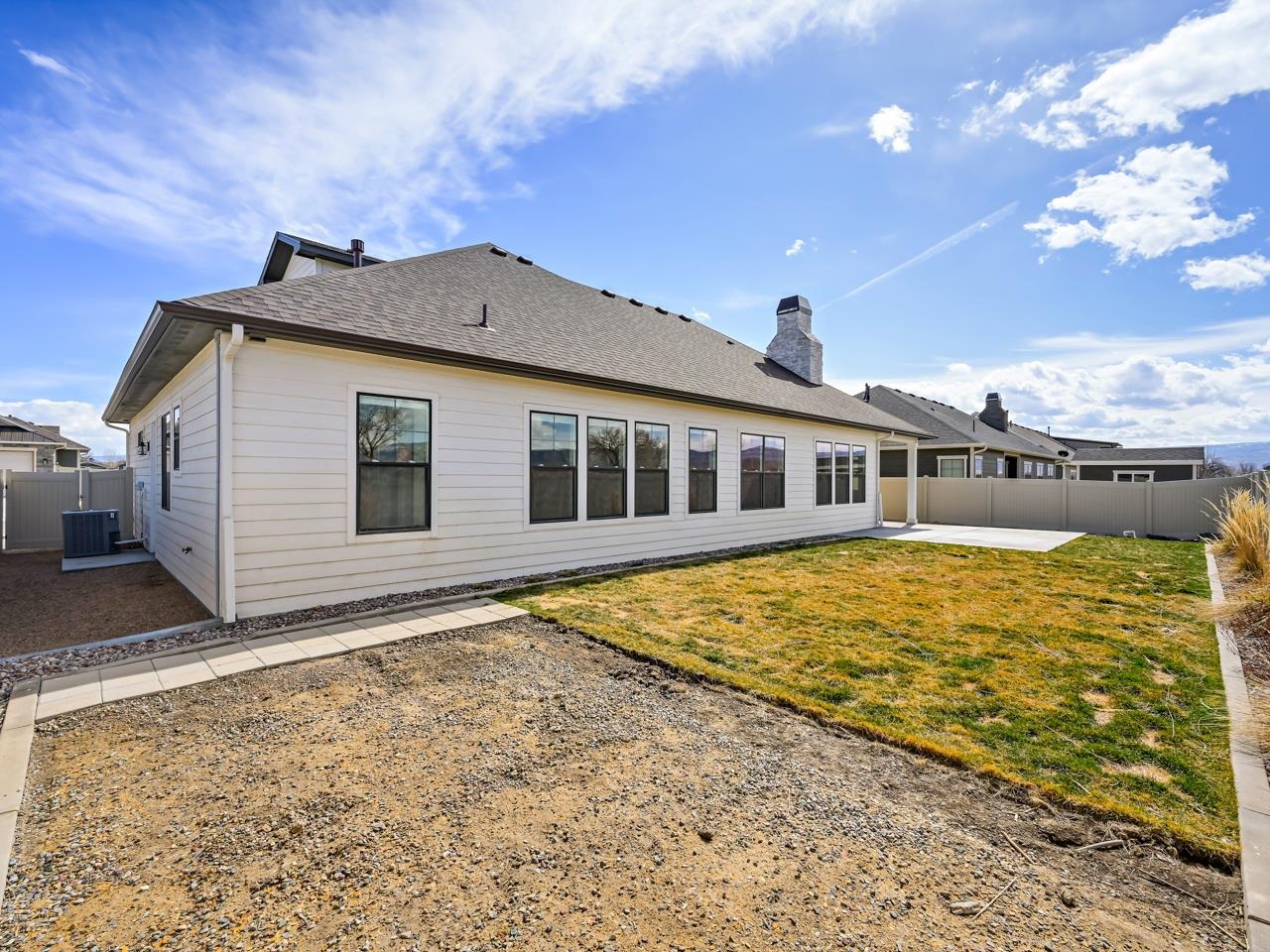 823 Red Apple Road Grand Junction, CO 81505 - Photo 30 of 38 a front view of a house with a yard
