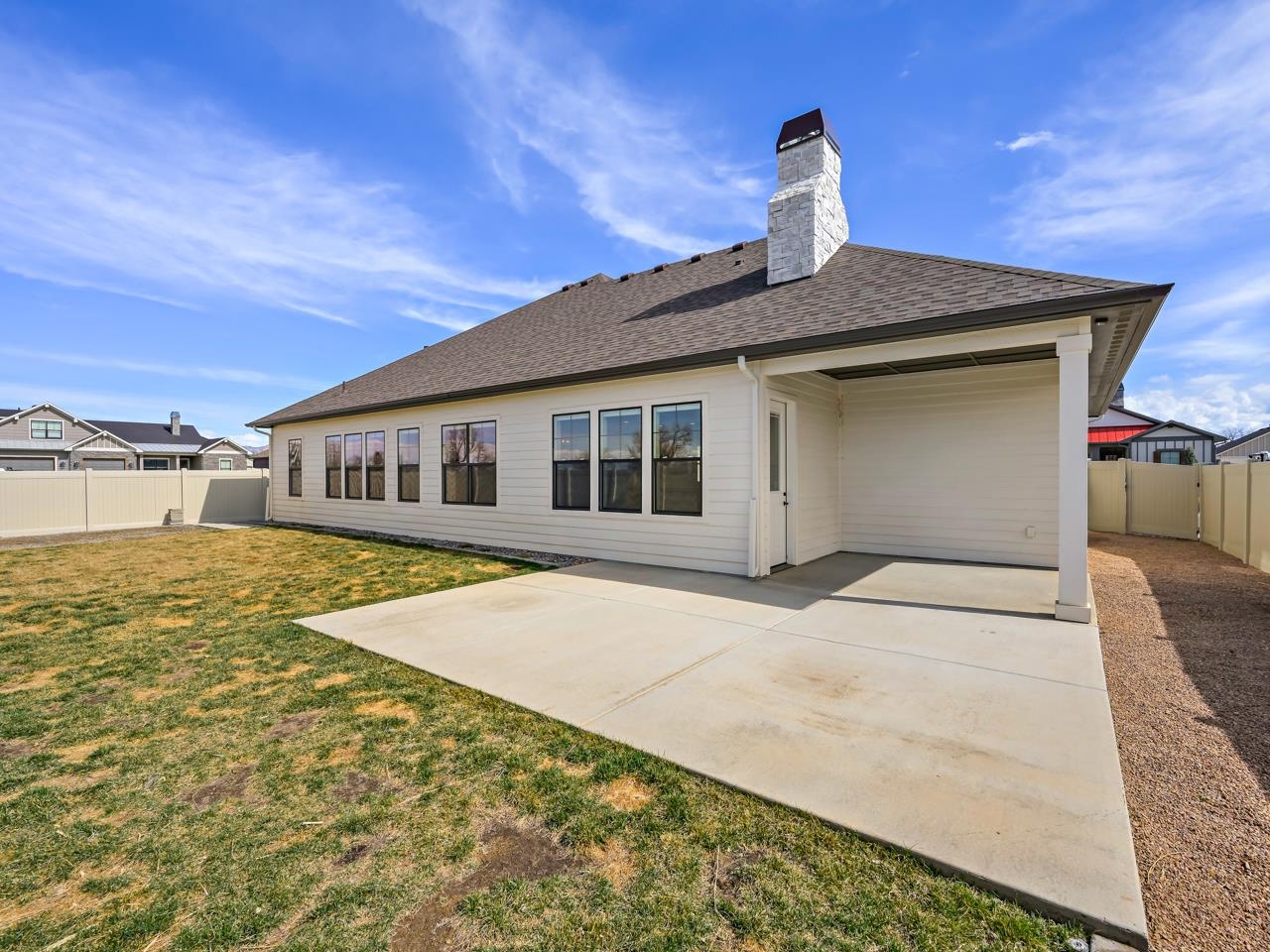 823 Red Apple Road Grand Junction, CO 81505 - Photo 31 of 38 a front view of a house with a yard