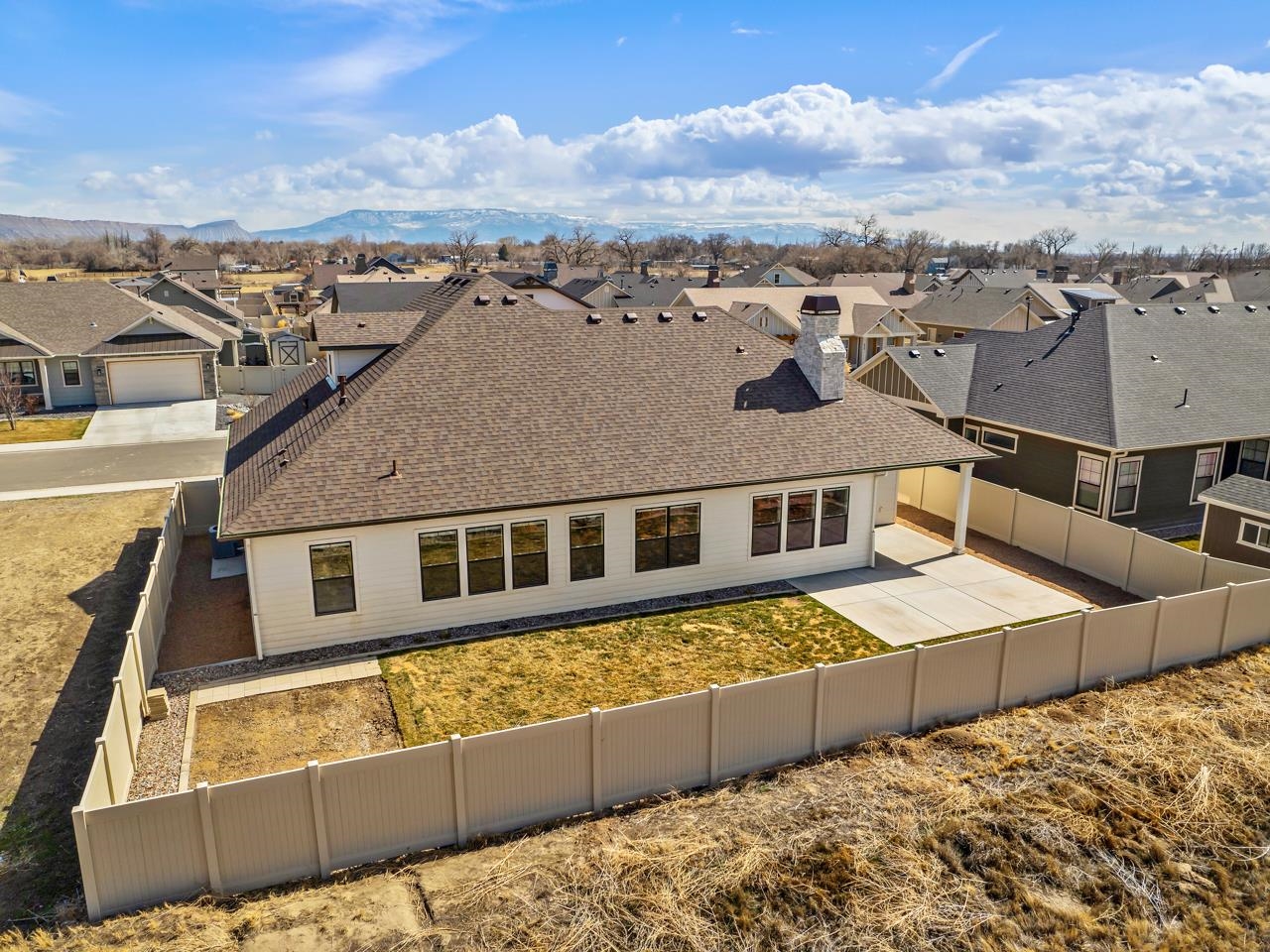 823 Red Apple Road Grand Junction, CO 81505 - Photo 33 of 38 an aerial view of a house with a yard