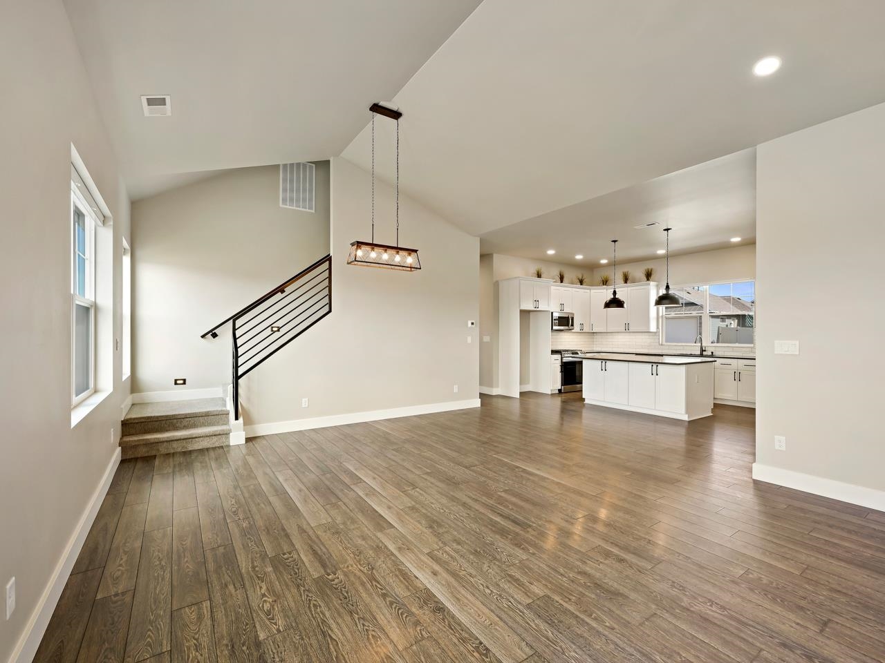 823 Red Apple Road Grand Junction, CO 81505 - Photo 9 of 38 a view of kitchen with furniture and wooden floor