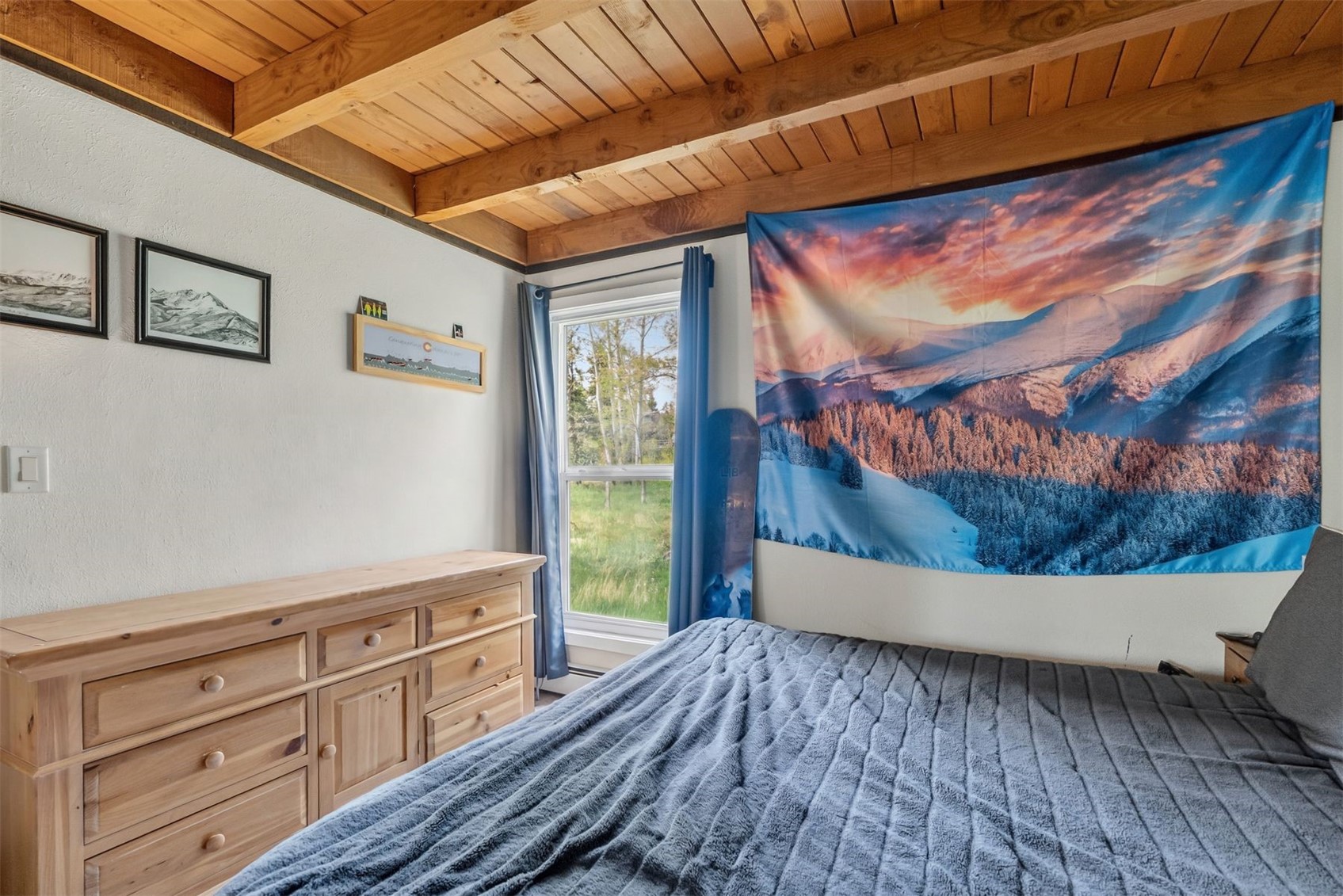8100 Ryan Gulch Road, Unit 106 Wildernest, CO 80498 - Photo 19 of 43 a living room with furniture and a wooden floor