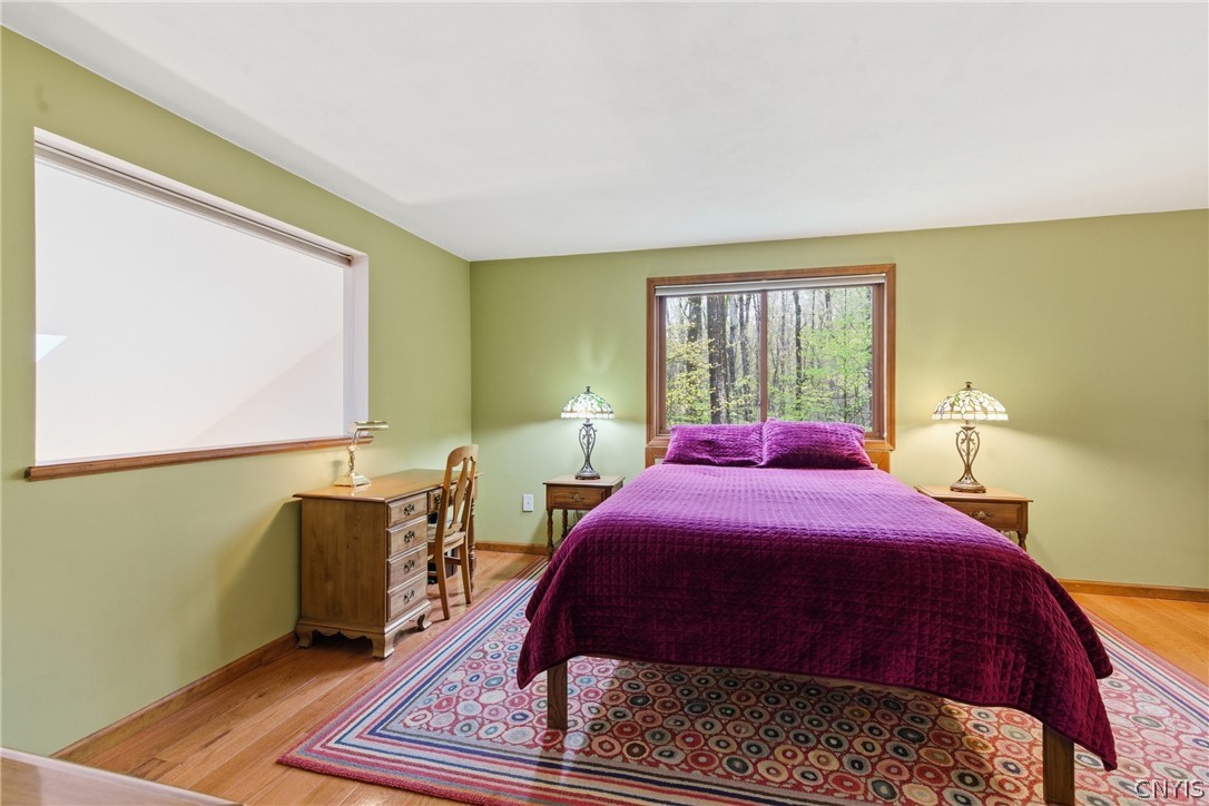 7566 Old Woods Road Preble, NY 13159 - Photo 23 of 50 Upstairs bedroom with loft cutout