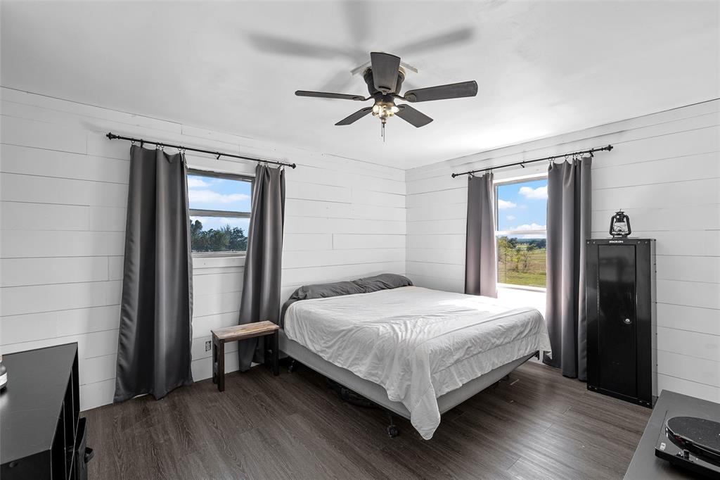 2139 Meandering Way China Spring, TX 76633 - Photo 7 of 20 a bedroom with a bed and a window