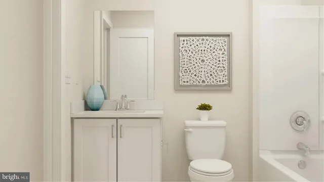 a bathroom with a sink a toilet and a bathtub