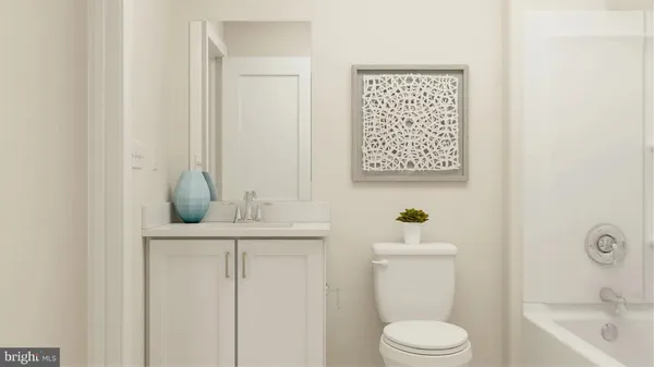 a bathroom with a sink a toilet and a bathtub