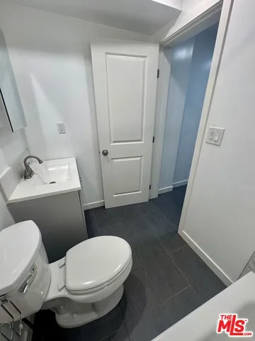 a bathroom with a sink and a toilet