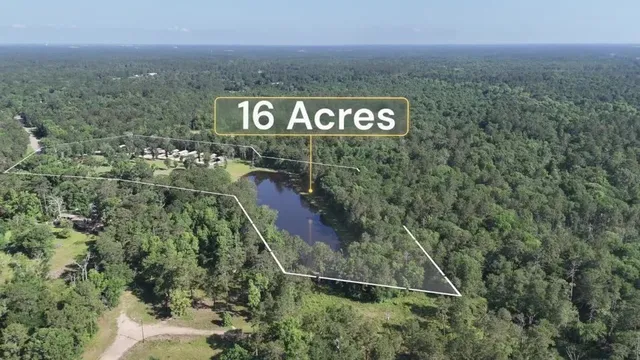 a view of sign board and green space