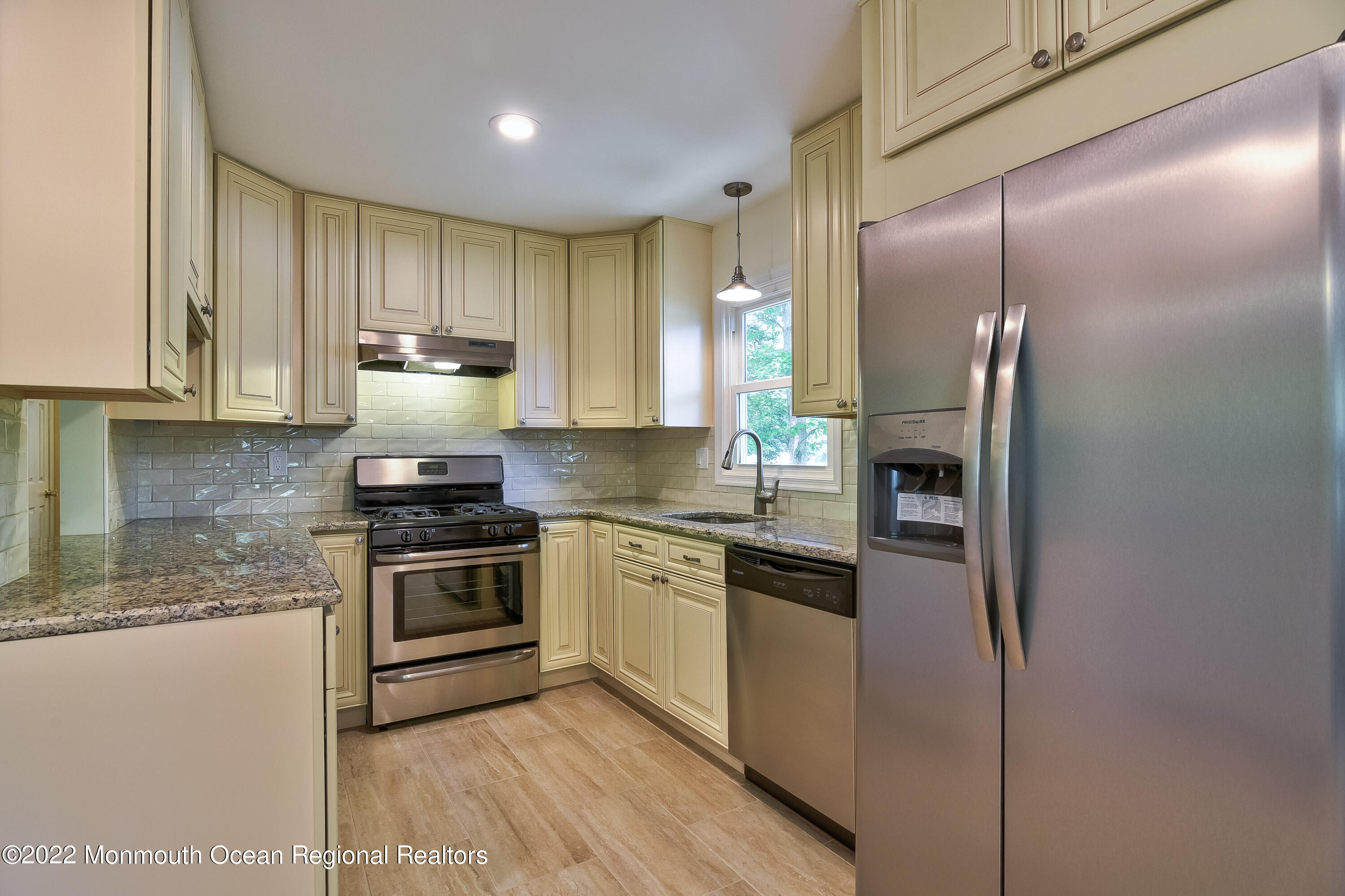 195 North County Line Road Jackson, NJ 08527 - Photo 6 of 20 a kitchen with stainless steel appliances granite countertop a stove a refrigerator and a sink