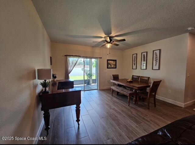 1807 Elkins Point Melbourne, FL 32935 - Photo 11 of 13 a view of a workspace with furniture window and wooden floor