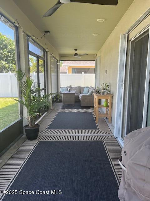 1807 Elkins Point Melbourne, FL 32935 - Photo 13 of 13 a living room with a bed furniture and a large window