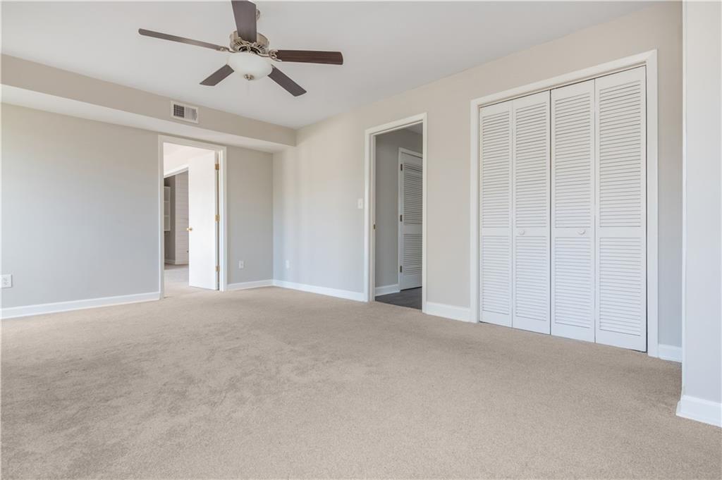 1211 Wynnes Ridge Circle Marietta, GA 30067 - Photo 25 of 35 a view of an empty room with a window