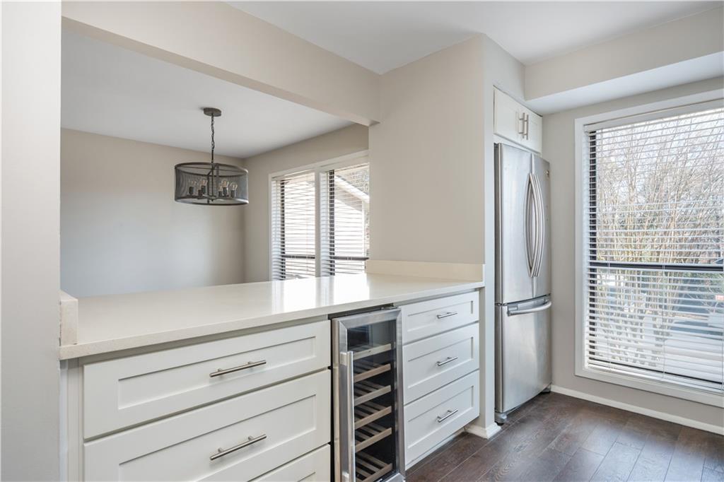 1211 Wynnes Ridge Circle Marietta, GA 30067 - Photo 7 of 35 a view of cabinets and wooden floor