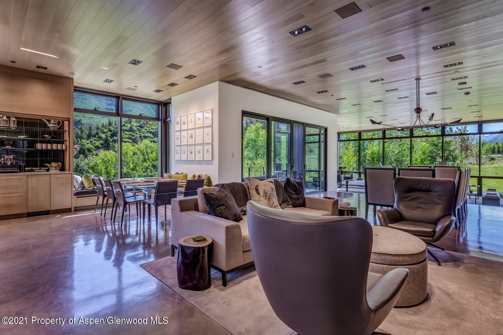 276 Coach Road Aspen, CO 81611 - Photo 12 of 68 a living room with lots of furniture and a large window