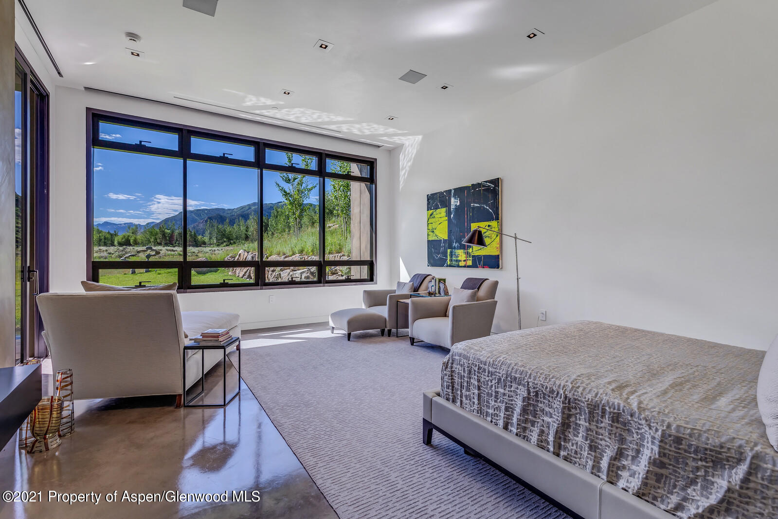 276 Coach Road Aspen, CO 81611 - Photo 27 of 68 a living room with furniture and large windows