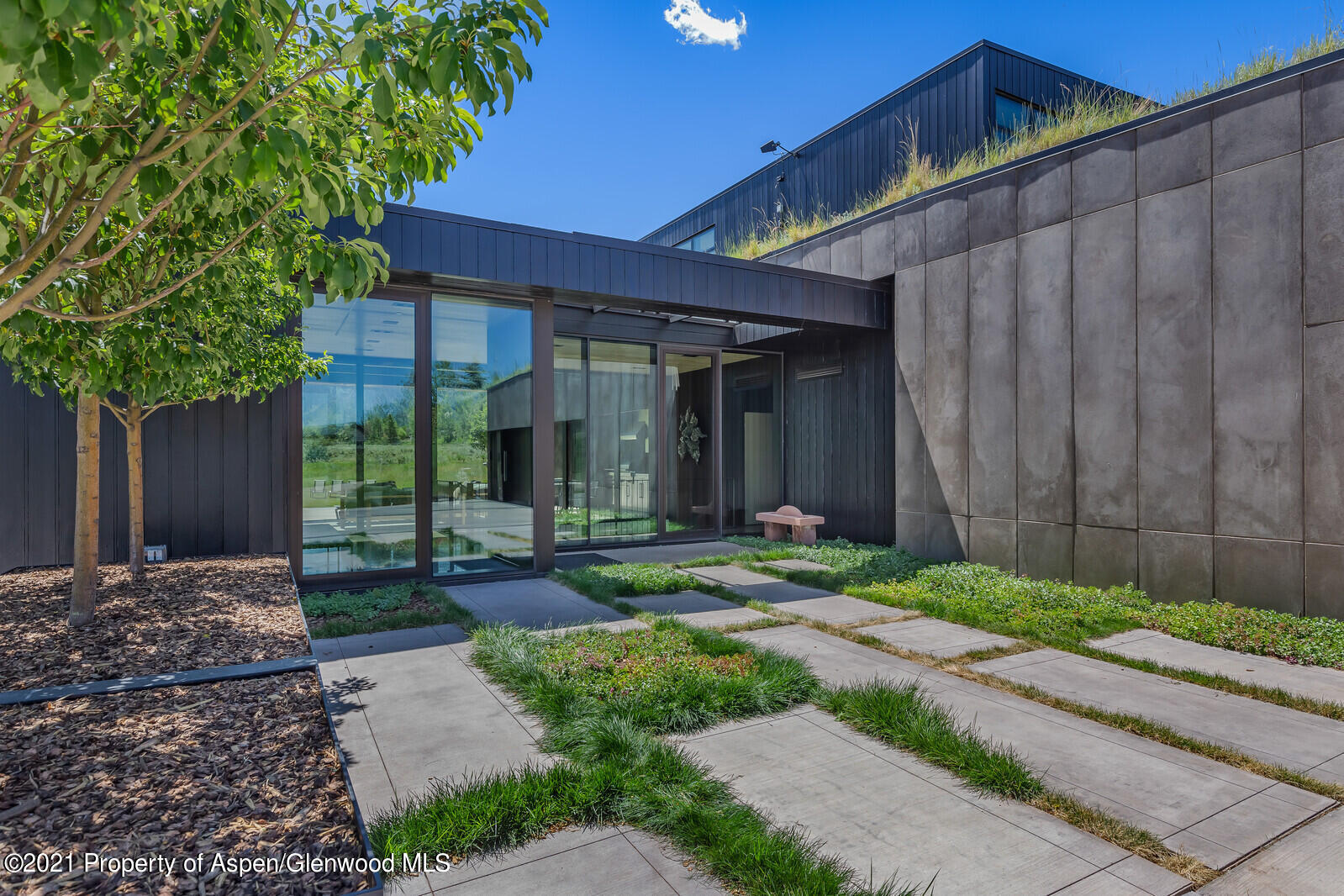 276 Coach Road Aspen, CO 81611 - Photo 3 of 68 a view of a house with backyard and wooden fence