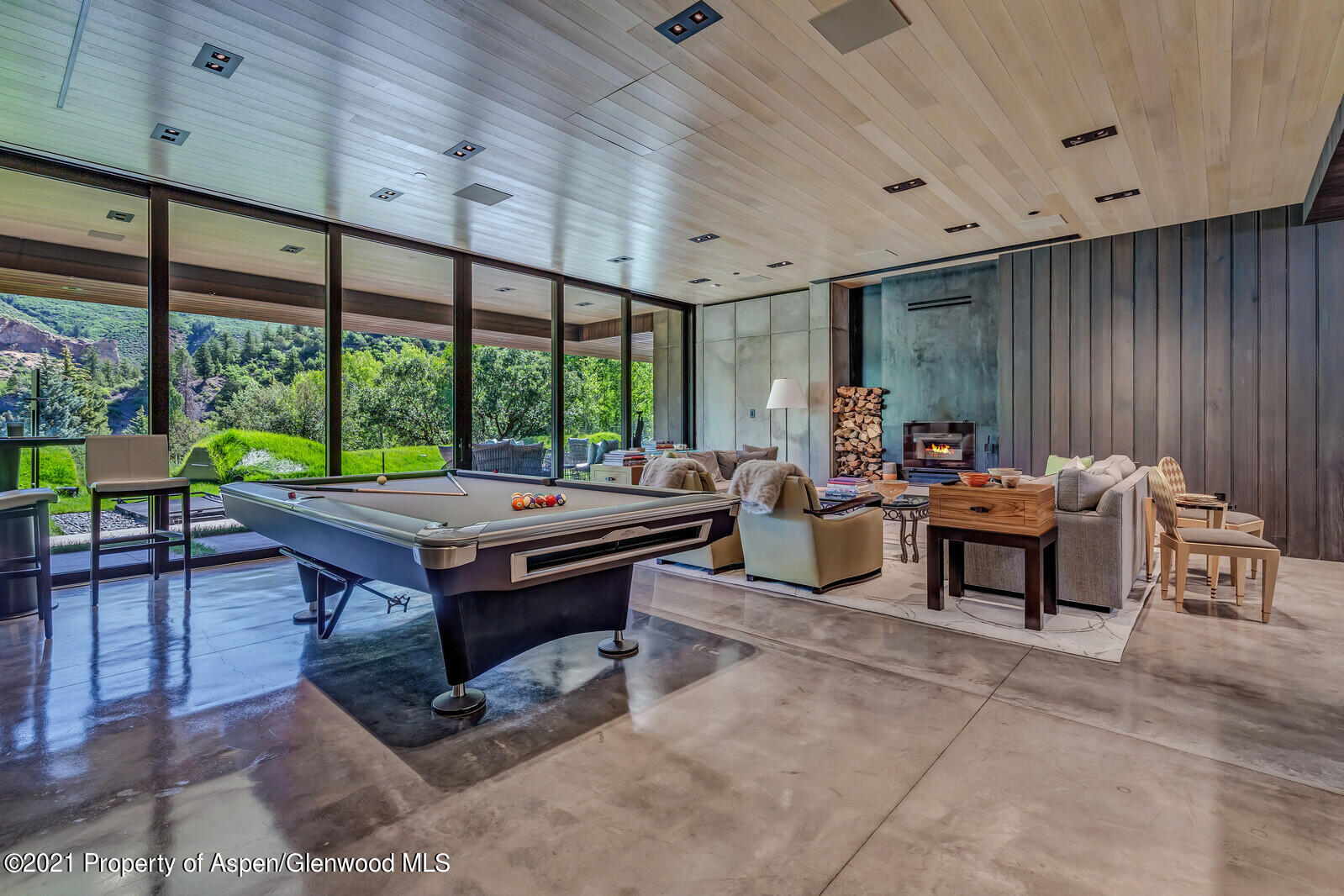 276 Coach Road Aspen, CO 81611 - Photo 42 of 68 a living room with furniture and a large window
