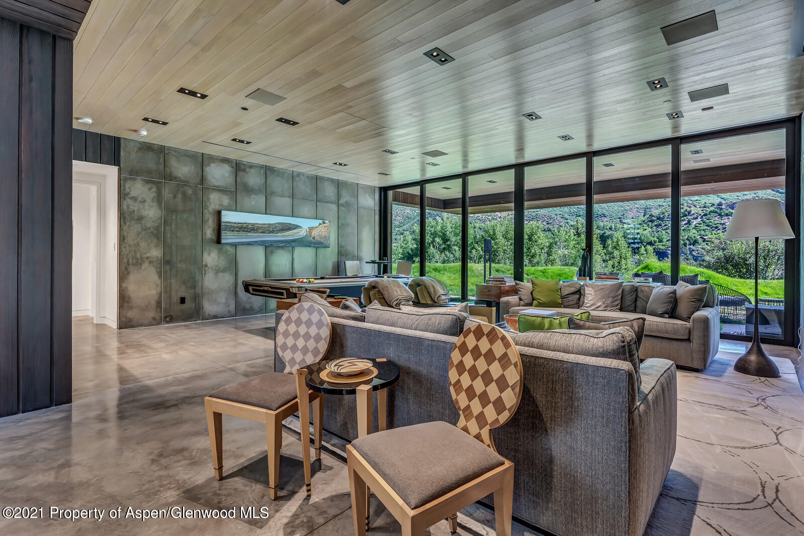 276 Coach Road Aspen, CO 81611 - Photo 43 of 68 a living room with furniture and a large window