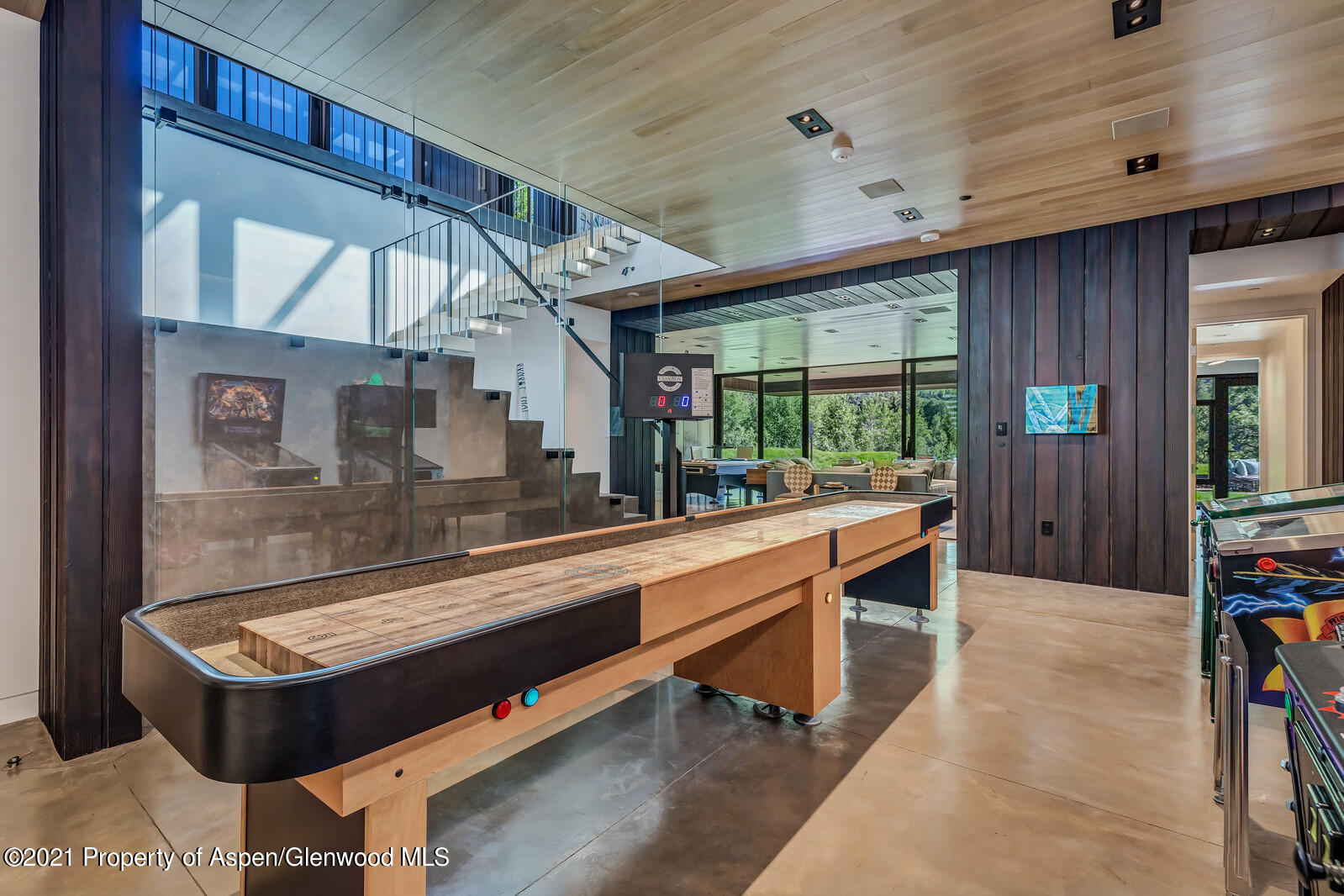 276 Coach Road Aspen, CO 81611 - Photo 47 of 68 a room with wooden floor pool table and furniture