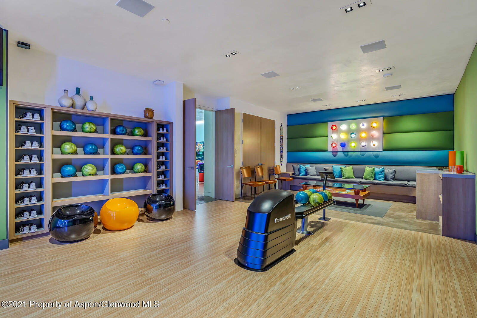 276 Coach Road Aspen, CO 81611 - Photo 50 of 68 a bedroom with furniture and a flat screen tv