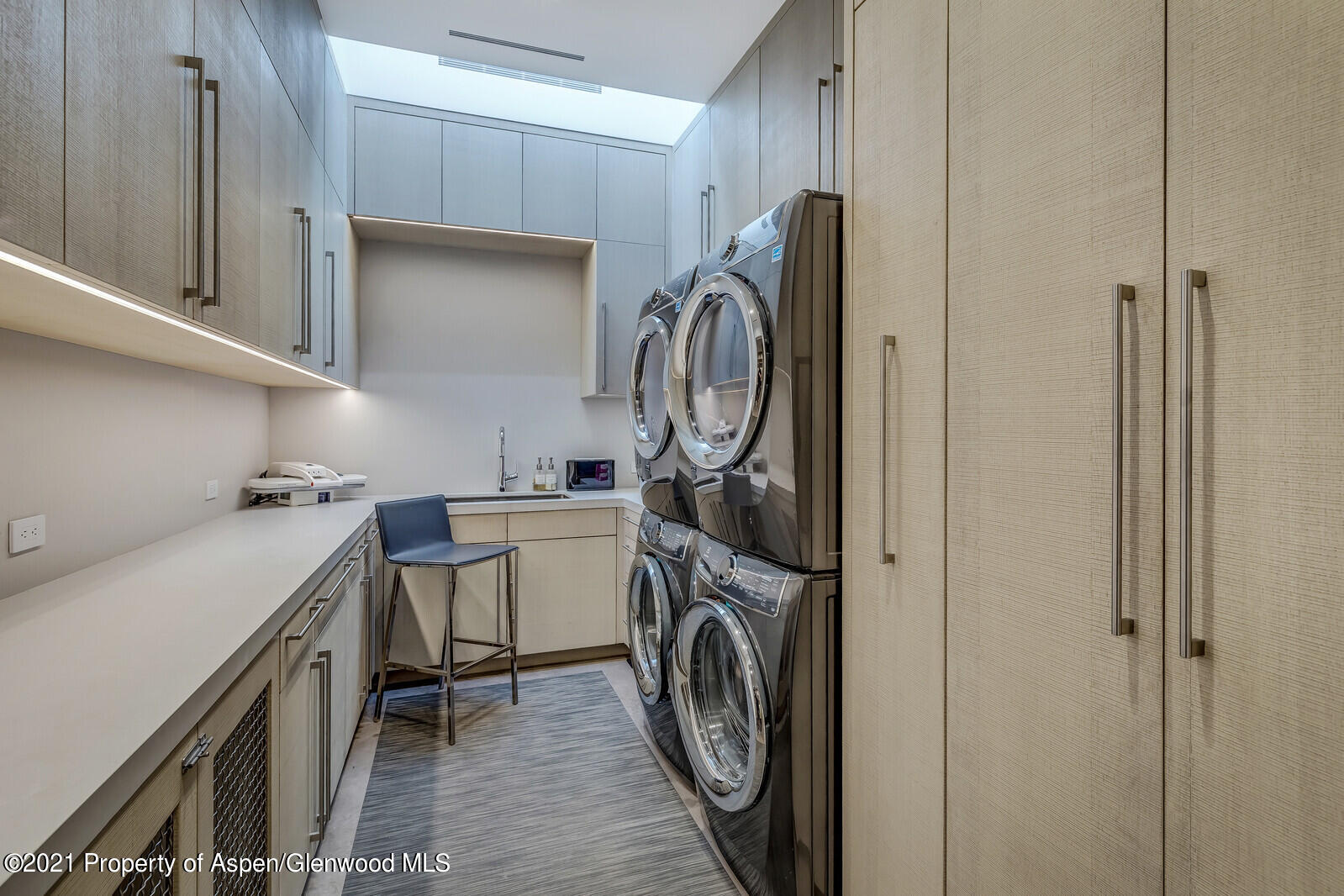 276 Coach Road Aspen, CO 81611 - Photo 67 of 68 a storage room with washer and dryer