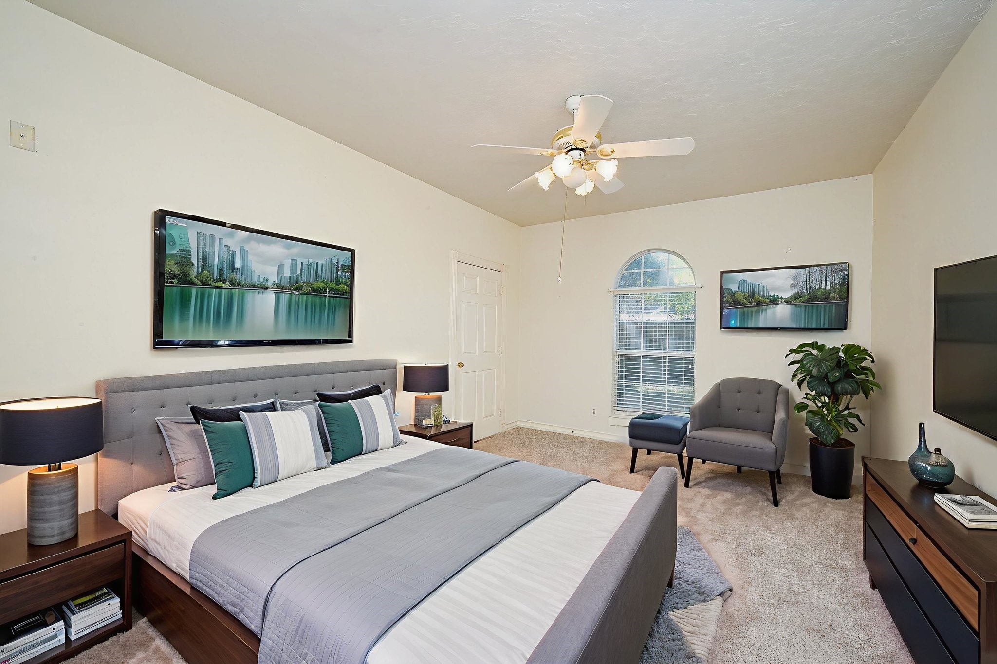 26824 Victory Lane Spring, TX 77386 - Photo 18 of 27 a bedroom with a large bed and a flat screen tv