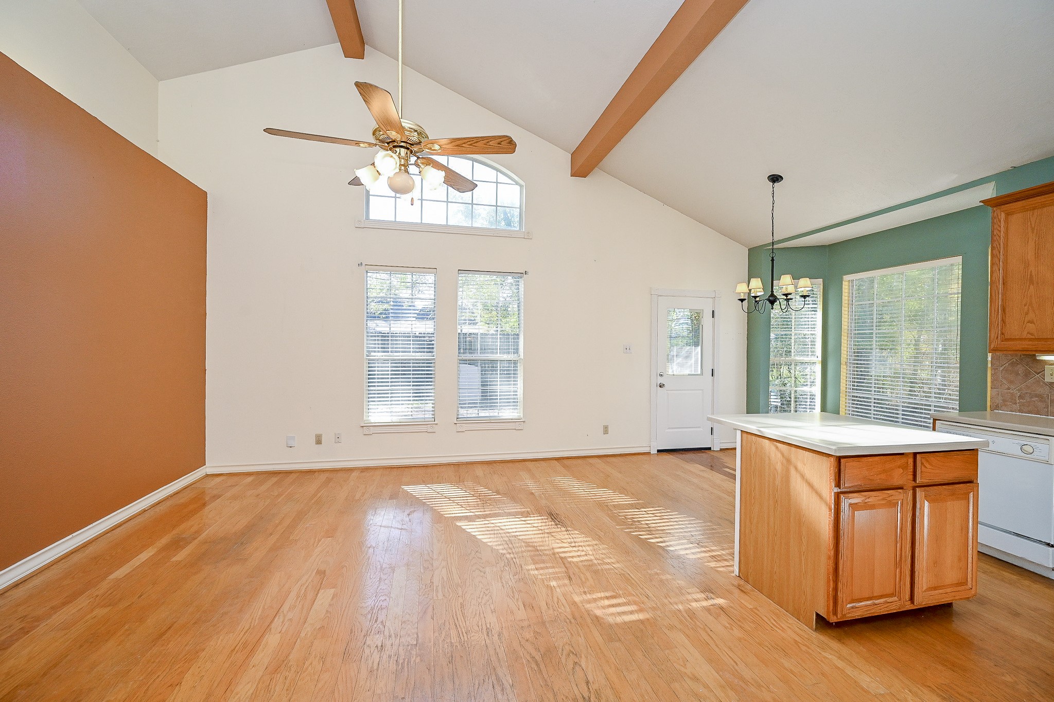 26824 Victory Lane Spring, TX 77386 - Photo 10 of 27 a view of an empty room with wooden floor and a window