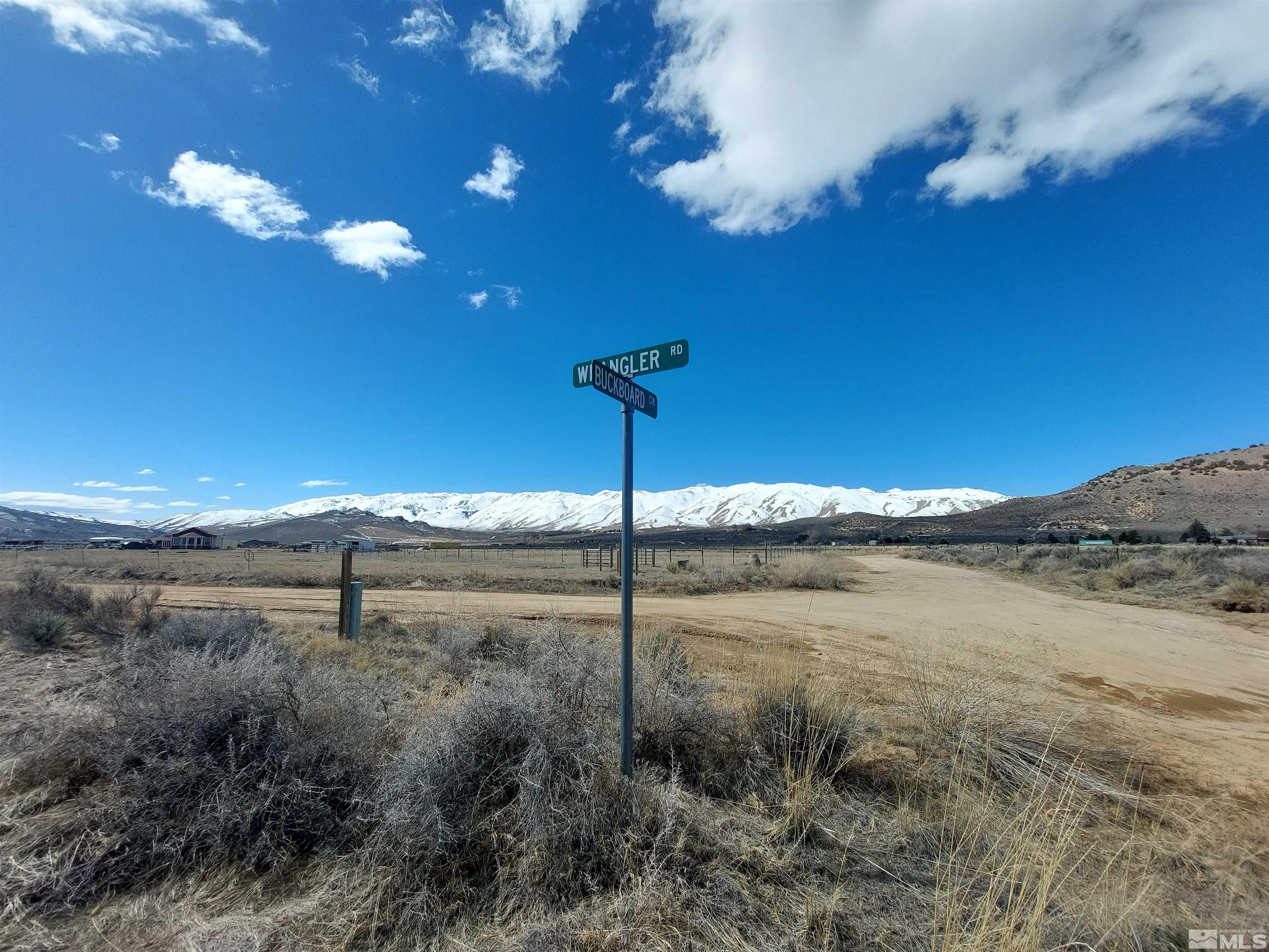 85 Buckboard Circle Reno, NV 89508 - Photo 13 of 14 a view of a lake with a beach