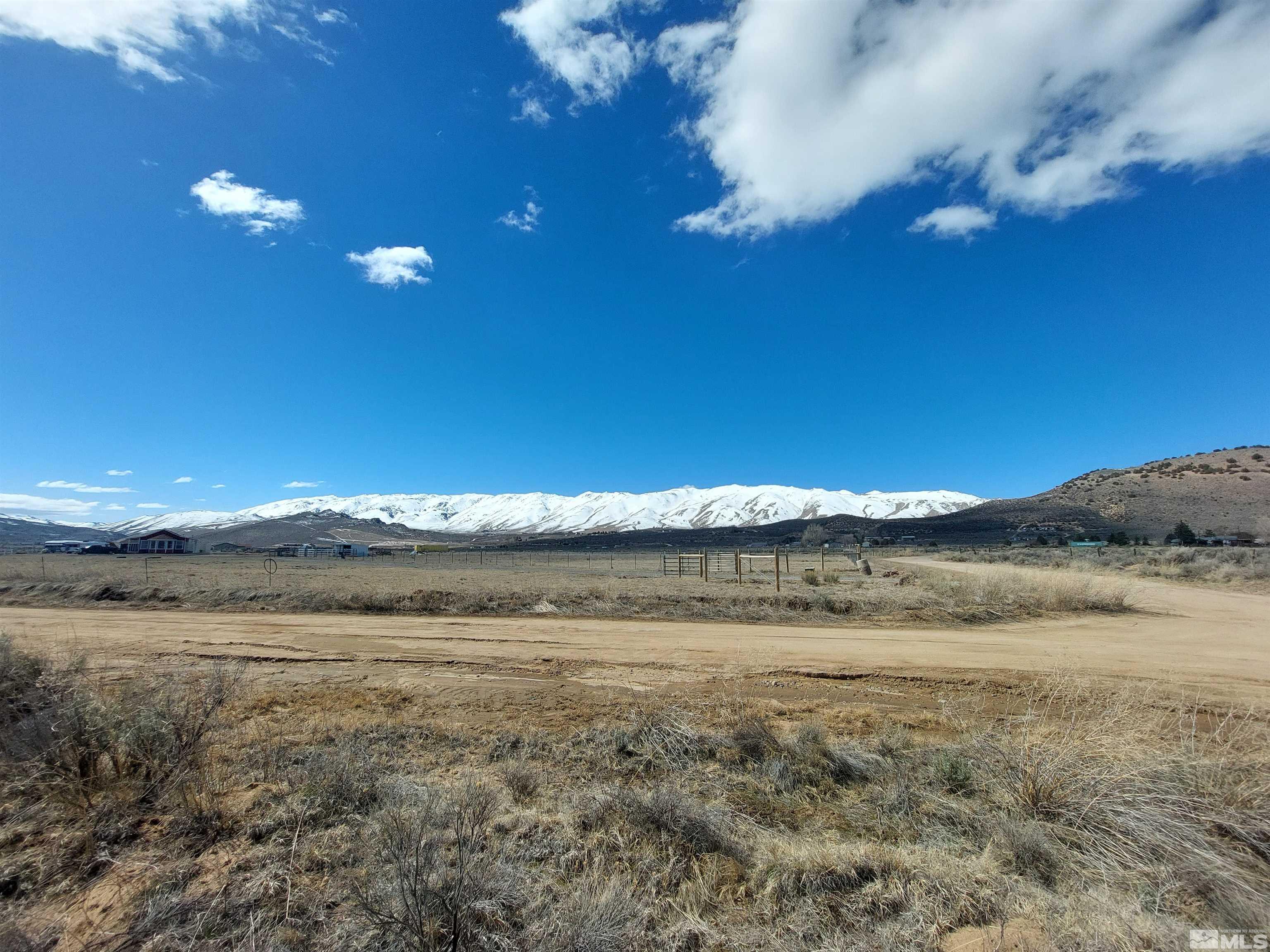 85 Buckboard Circle Reno, NV 89508 - Photo 2 of 14 a view of a lake view and mountain view