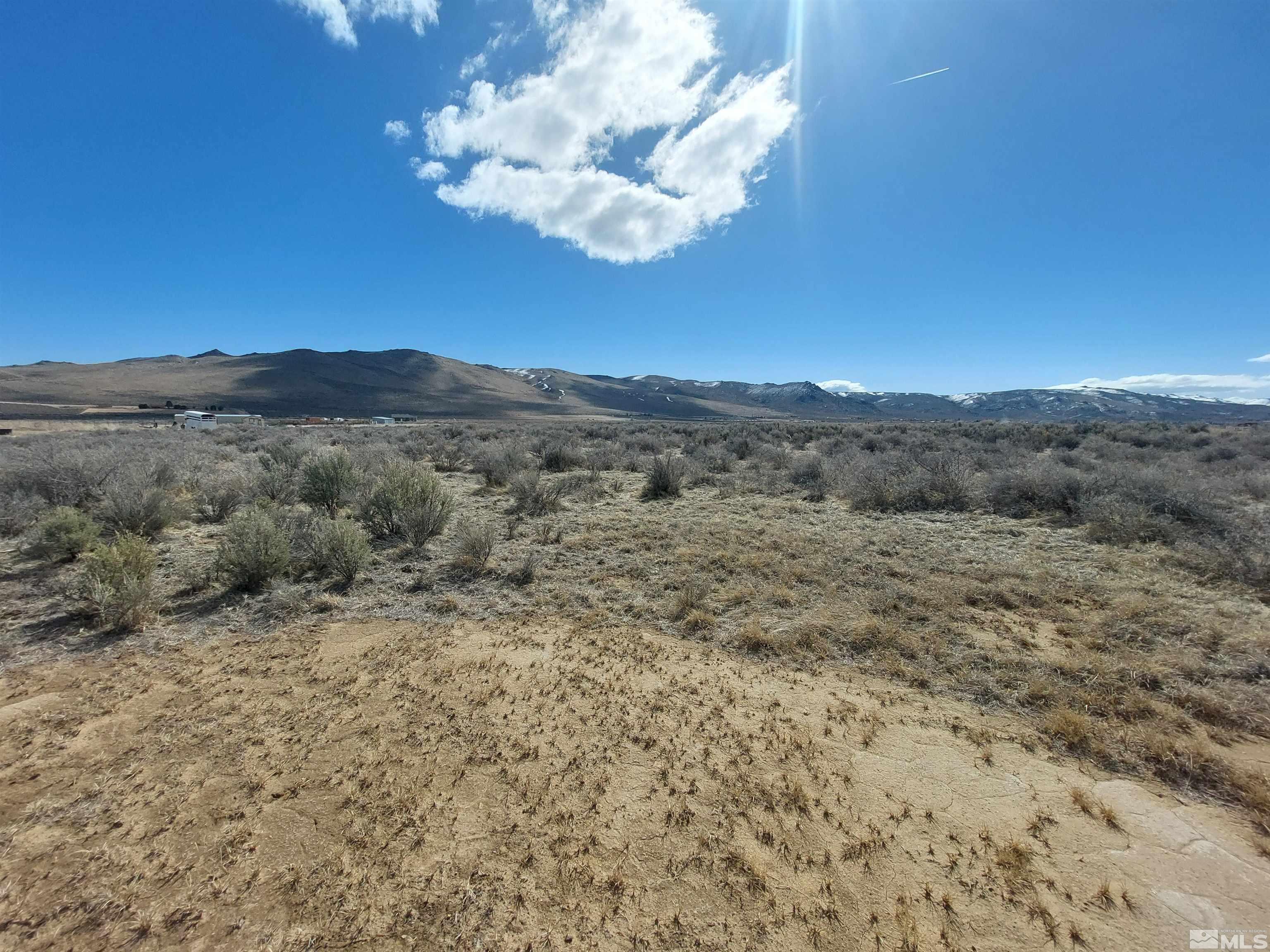 85 Buckboard Circle Reno, NV 89508 - Photo 8 of 14 a view of a house with a mountain view