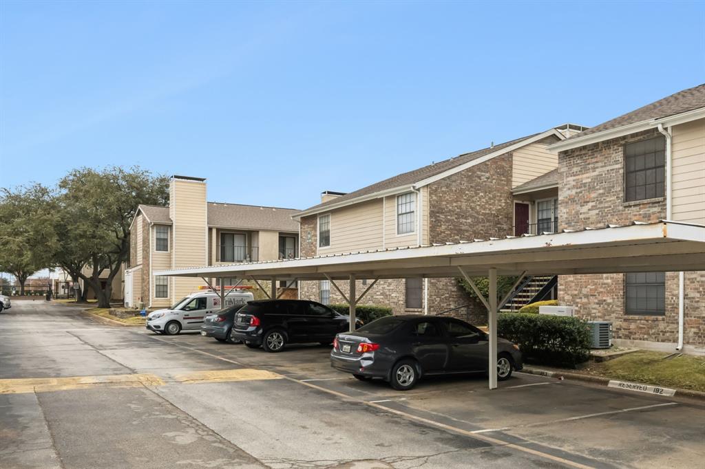 4748 Old Bent Tree Lane, Unit 1808 Dallas, TX 75287 - Photo 24 of 28 a car parked in front of a building