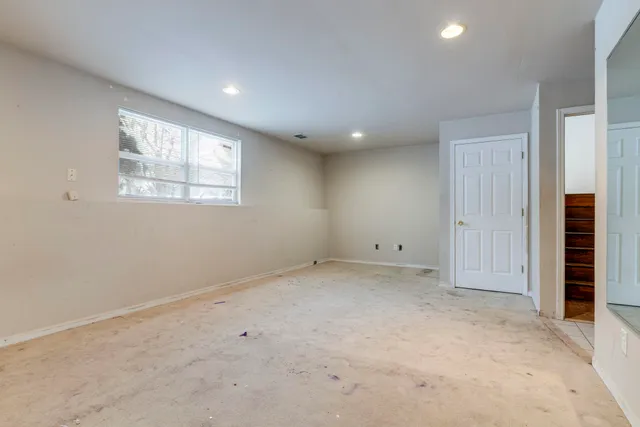 an empty room with windows