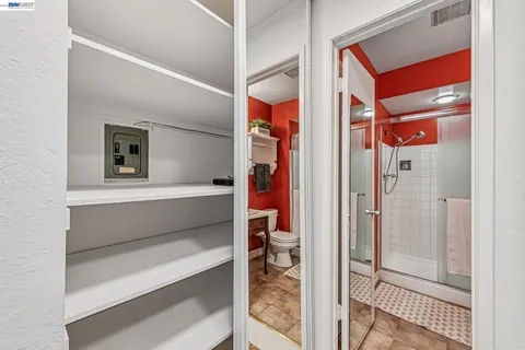 a bathroom with a shower and a shower curtain